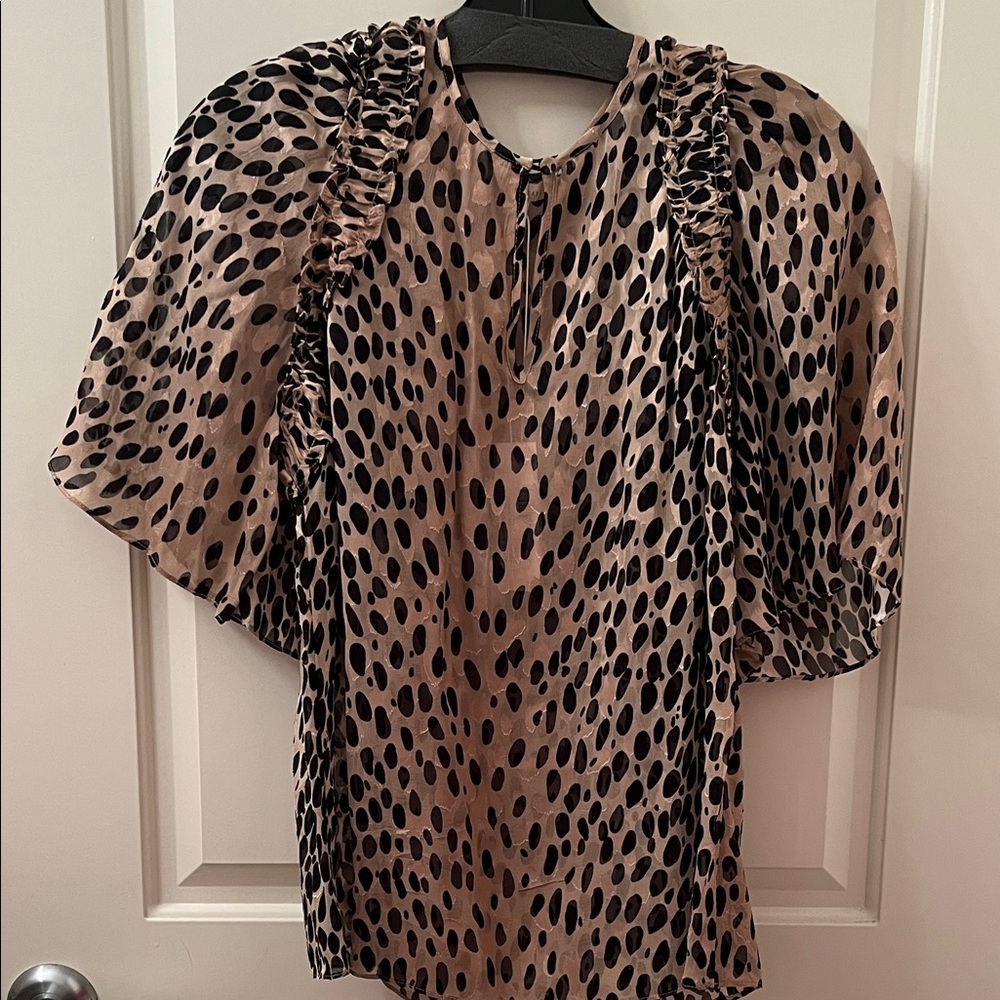 REBECCA TAYLOR. Animal print and Ruffle Trim blouse. Size xs. NWT
